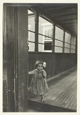 Little Girl Standing At Entrance To A Gallery — Lewis Hine