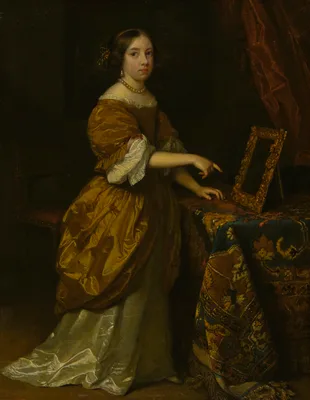 Girl Standing before a Mirror — Caspar Netscher