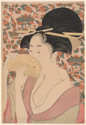 Woman Holding a Tortoise-shell Hair-comb — Kitagawa Utamaro