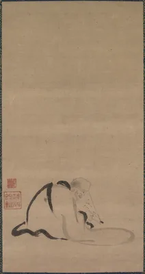 Seated Priest