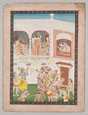 Radha and Hindu God Krishna celebrating the festival Holi