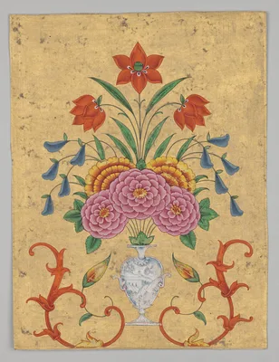 Vase with flower arrangement and scrollwork