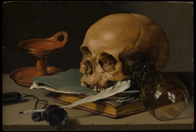 Still Life with a Skull and a Writing Quill — Pieter Claesz