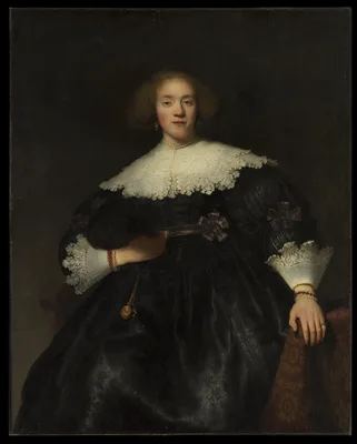 Portrait of a Young Woman with a Fan — Rembrandt